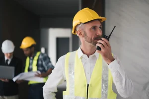 professional engineers with 2 way radio